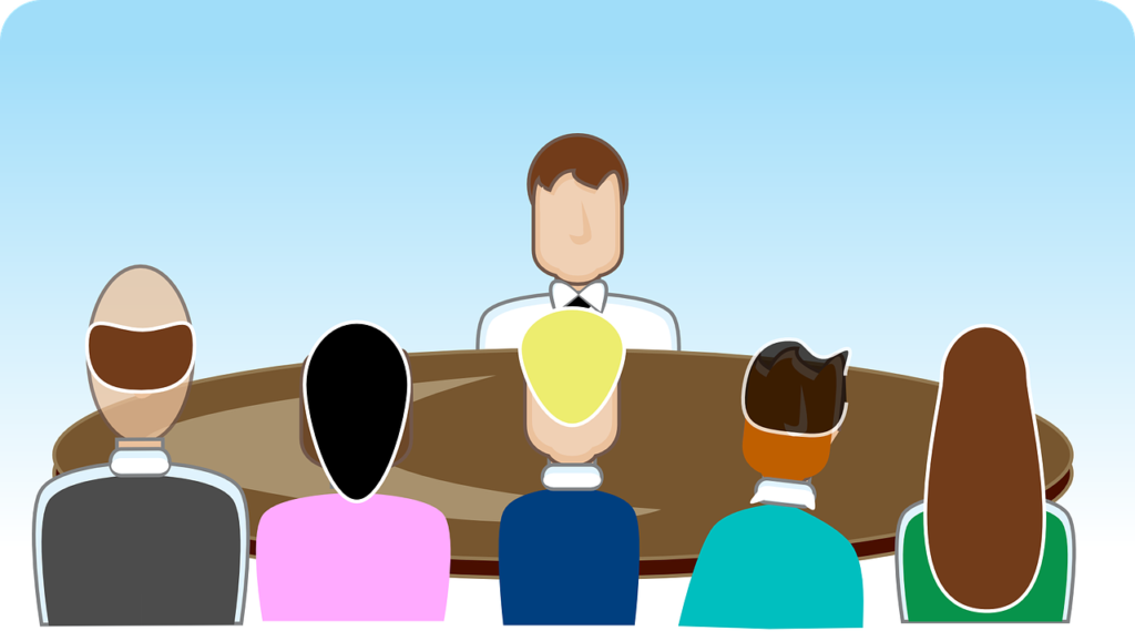 Image représentant un jury d'experts autour d'une table et qui délivre la certification des évaluateurs RICS